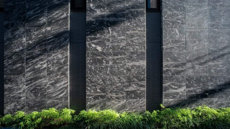 Why are architects returning to natural stone for sustainable design?